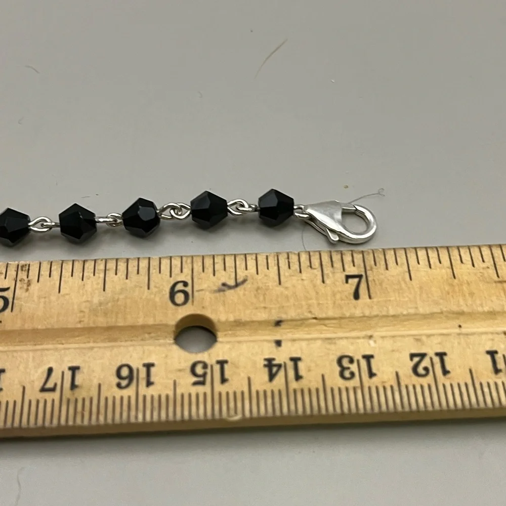 Black and Sterling Silver Beaded Bracelet with Fused Glass Center as an Accent